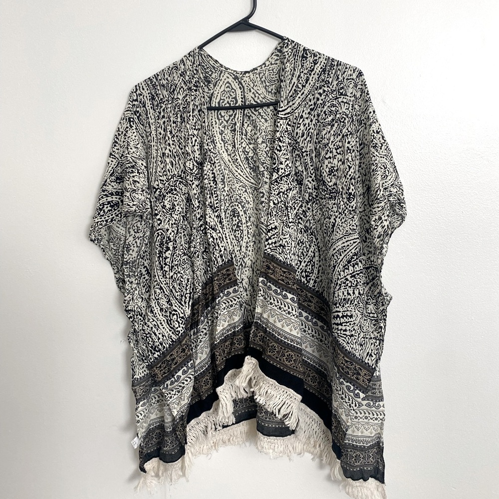 Black, tan and white patterned kimono with fringe